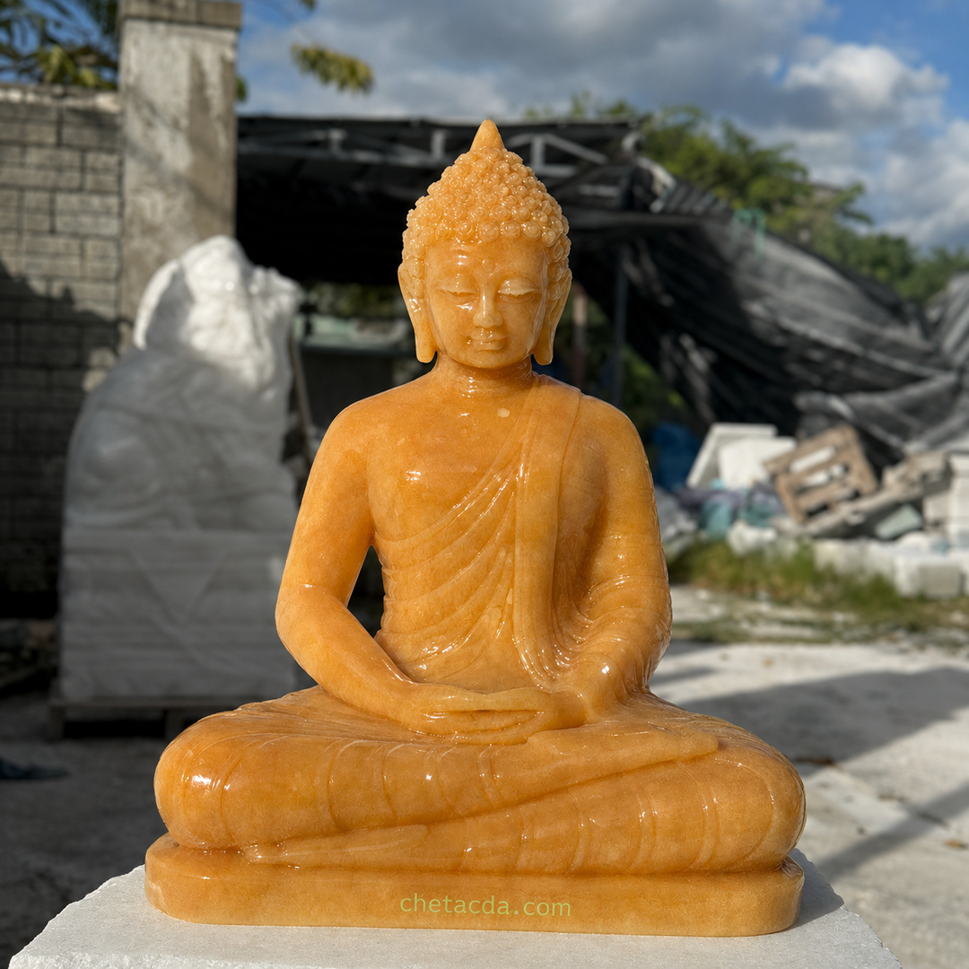 Tượng Phật Thích Ca bằng đá ngọc Hoàng Long onyx vàng – Xuân Ngọc Phát